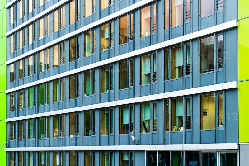Modern high-rise office building in the European Quarter on the Kirchberg Plateau in Luxembourg City, Luxembourg. Contemporary corporate architecture photographed in daylight, featuring glass facade, clean geometric lines, and an urban business district atmosphere representing finance, administration, and modern city development