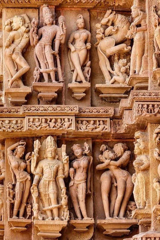 Famous erotic stone carving sculptures, Lakshmana Temple, Khajuraho, India. Unesco World Heritage Site