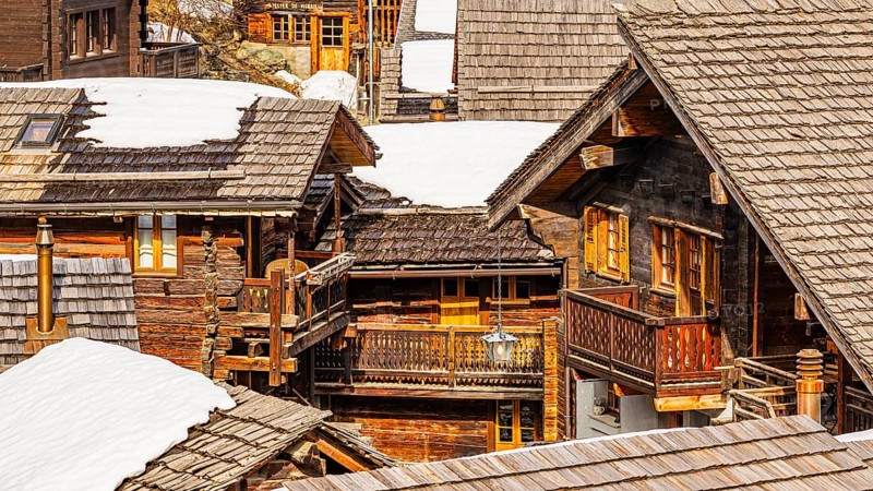 Snow-covered old farmhouses with balconies, historic town center, Grimentz, Val d'Anniviers, Valais Alps, Canton of Valais, Switzerland