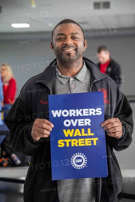 Warren, Michigan USA - 6 May 2025 - Members of the United Auto Workers who work at Stellantis rally, demanding that the company bring auto jobs back to Michigan. UAW leaders note that Stellantis has substantial excess capacity at its American plants