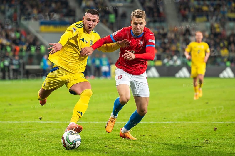 WROCLAW, POLAND - OCTOBER 14, 2024: UEFA Nations League match Ukraine - Czechia. In action Oleksandr Zubkov (L) and Ondrej Zmrzly (R)