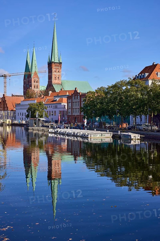 Church towers of St. Marien and St. Petri, reflections on the water surface, Hanseatic city of Lübeck, Schleswig-Holstein, Germany