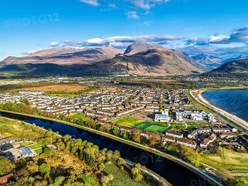 View of Caledonian Canal, Caol Beach and Nevis Range Mountains from a drone, Corpach, Fort William, Highland, Scotland, United Kingdom