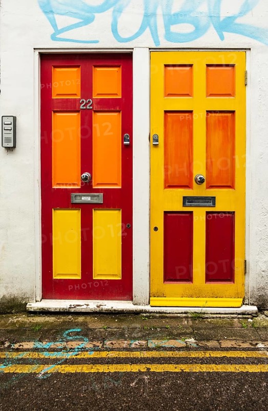 2 colourfully painted front doors in Brighton, Great Britain