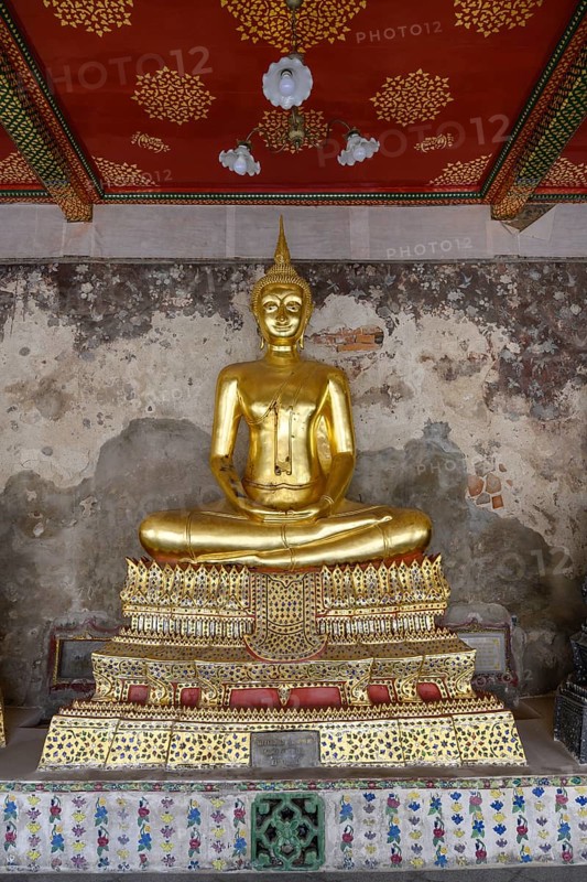 Bangkok, Thailand. February 20th 2025. An ornate golden Buddha in the The Wat Suthat Thepwararam