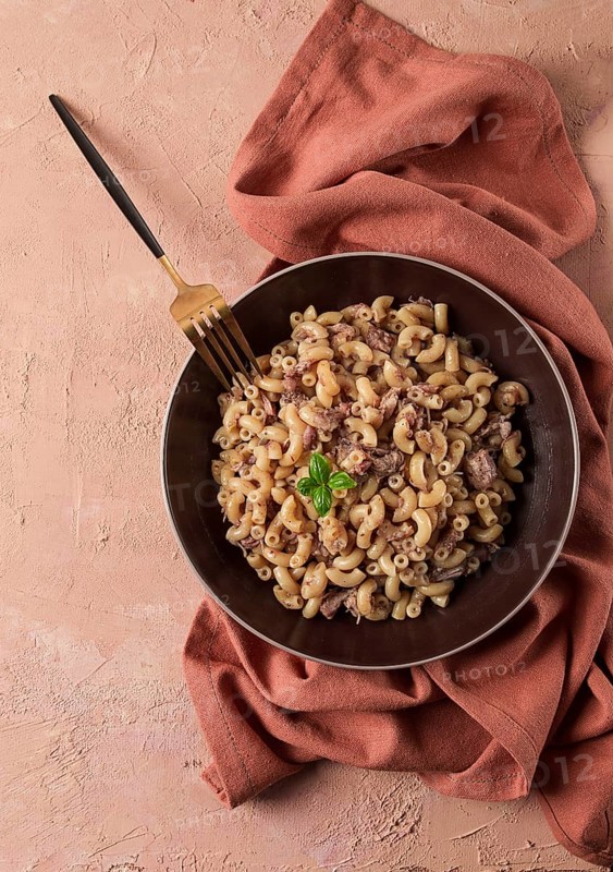 Pasta with stewed meat, pasta in the navy, horns, homemade, no people