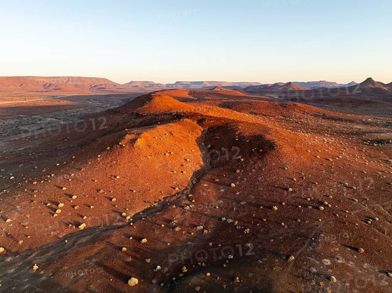 Aerial view, evening mood, hills and dry landscape near Palmwag, Kunene region, Namibia