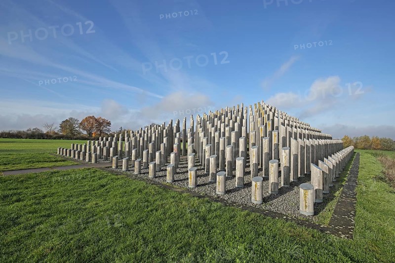 Pole pyramid sculpture, modern art, abstract art, art installation, large sculpture, many geometric wooden posts vertically in the ground, row, series, pyramid, RheinMain Regional Park, Rhine Main, Dreieich, Hesse, Germany