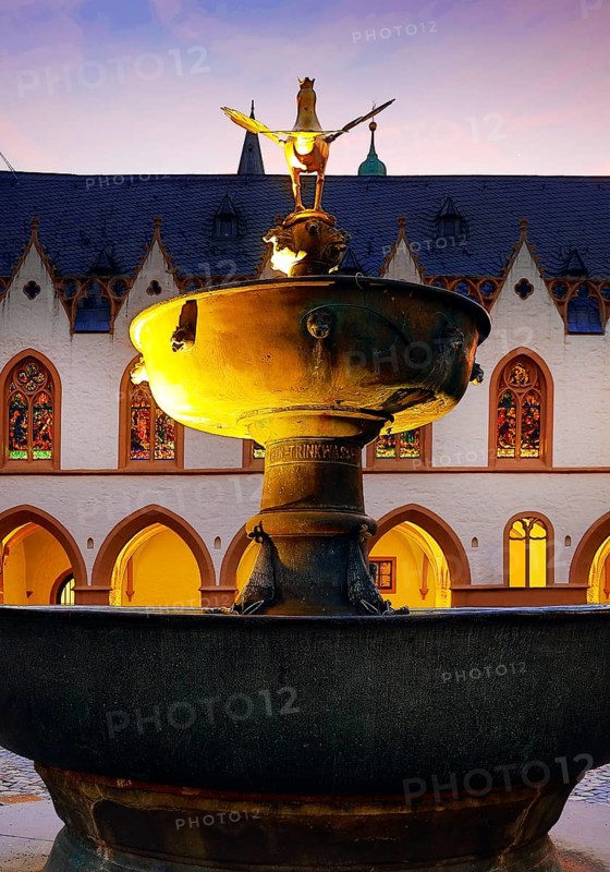 View from the market fountain to the late Gothic town hall of Goslar in the evening, Old Town, UNESCO World Heritage Site, Lower Saxony, Germany