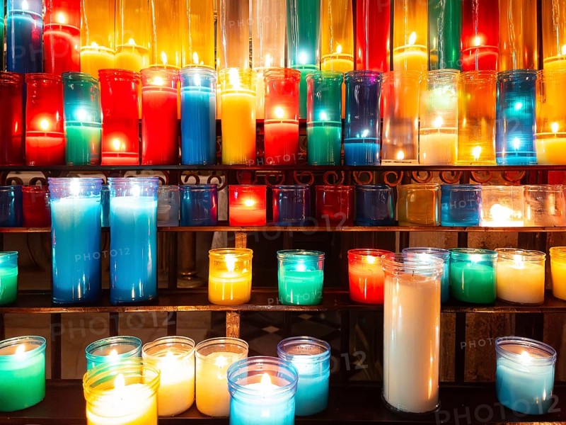 Colourful devotional candles in a church in Barcelona, Spain