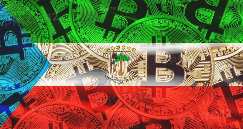 Bitcoin coins on Equatorial Guinea flag background. Golden bitcoin coins on Equatorial Guinea flag background
