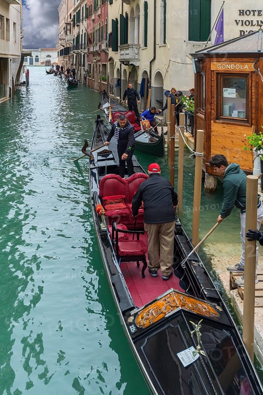 Tourists board gondola for round trip, Venice, Veneto, Italy