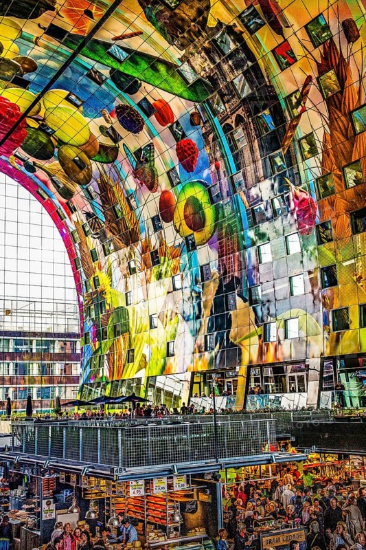 Markthal from 2014, offers over 100 food stalls and delicatessens with spectacular ceiling fresco cornucopia, Horn of Plenty by Arno Coenen and Iris Roskam, Rotterdam, the Netherlands