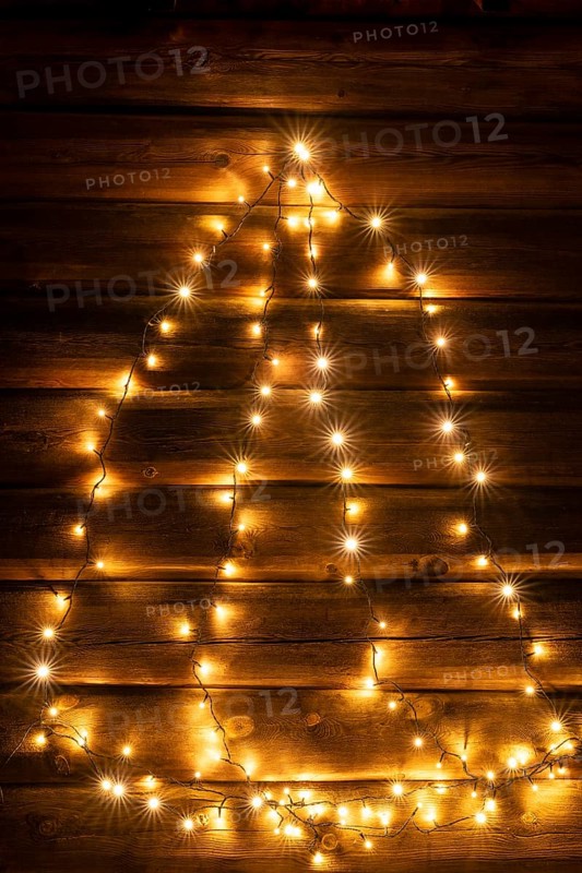 Glowing Christmas decoration on a wooden wall, Alvdal, Hedmark, Innlandet, Norway, November 2025