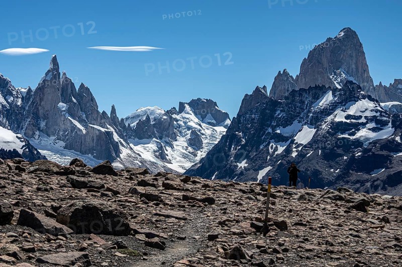 Trail to viewpoint Loma del Pliegue Tumbado, mountain range of Cerro Torre and Cerro Fitz Roy in the back, El Chalten, Argentina