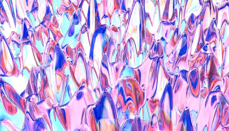 Abstract digital art showcasing ice peaks with vibrant tones of pink, blue, and purple. It creates an illusion of a futuristic, crystalline landscape