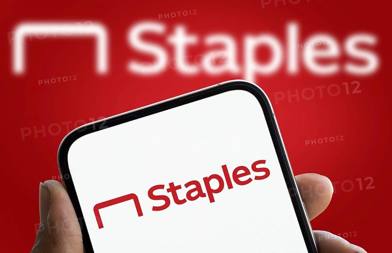 Staples logo is displayed on smartphone