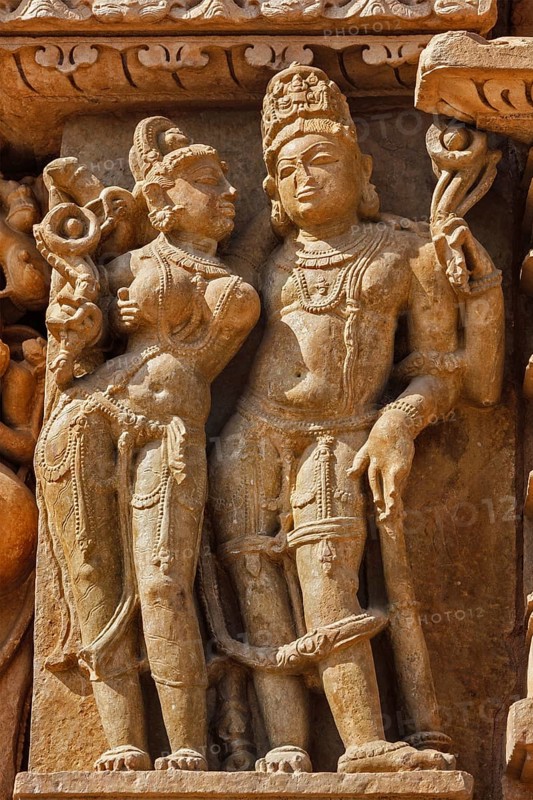 Stone carving bas relief sculptures on Adinath Temple, Khajuraho, Madhya Pradesh, India