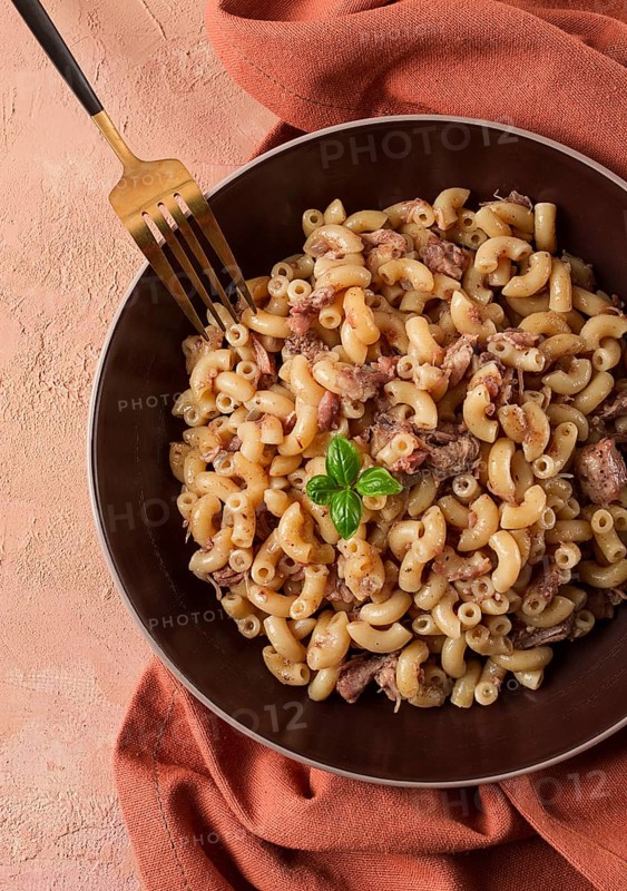 Pasta with stewed meat, pasta in the navy, horns, homemade, no people