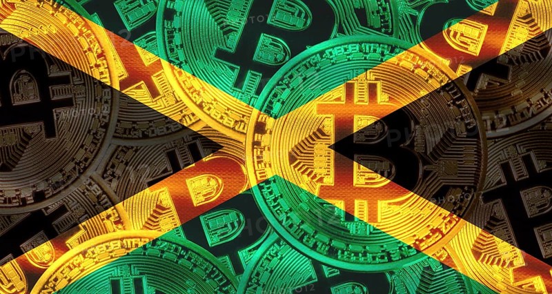 Bitcoin coins on Jamaica flag background. Golden bitcoin coins on Jamaica flag background