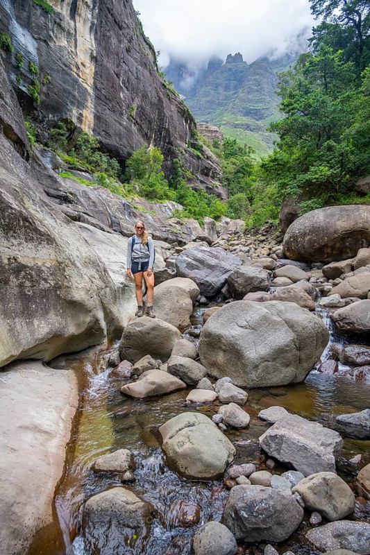 Female hiker in the Tugela Gorge or Tugela Gorge in the riverbed, Drakensberg National Park, KwaZulu Natal, South Africa