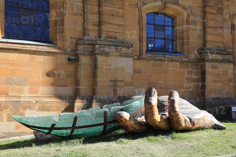 The glass ark, artists Ronald Fischer and Hubert Stern, a five metre long art object supported by a wooden hand, artists Tomas Indra and Libor Kuzdas. Here at a station in front of the Vierzehnheiligen pilgrimage church, Lichtenfels district, Upper Franconia, Bavaria, Germany (permanent work of art in public space)