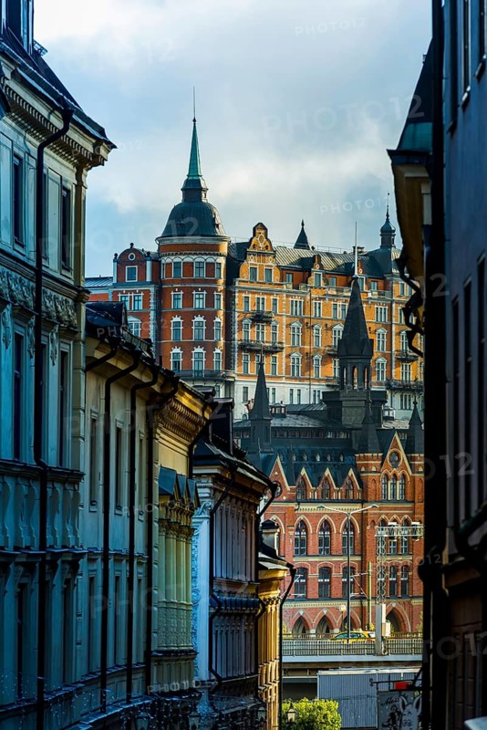 Historic buildings in an alley of Gamla Stan, old town, centre, attraction, famous, city centre, city trip, tourism, travel, holiday, architecture, historic, UNESCO, World Heritage Site, evening, culture, history, city history, medieval, urban, Stockholm, Sweden, Scandinavia