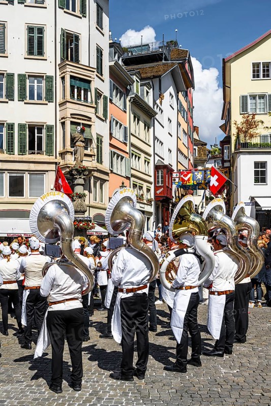 Historically costumed guildsmen in Zurich's Old Town, stand concert at Münzplatz, Zunft zum Weggen, Sechseläuten or Sächsilüüte, Zurich Spring Festival, Zurich
