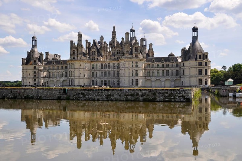 Castle Chateau de Chambord with the pond in France