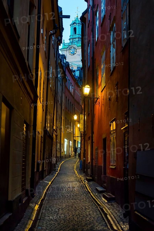 Houses in an alley of Gamla Stan, old town, centre, attraction, famous, city centre, city trip, tourism, travel, holiday, architecture, historic, UNESCO, world heritage site, evening, illuminated, evening shot, culture, history, city history, medieval, urban, Stockholm, Sweden, Scandinavia