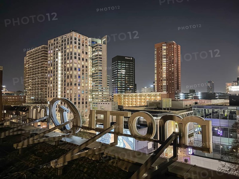 View from the roof terrace of Hotel MotelOne of the evening skyline of the city center of Rotterdam, the Netherlands