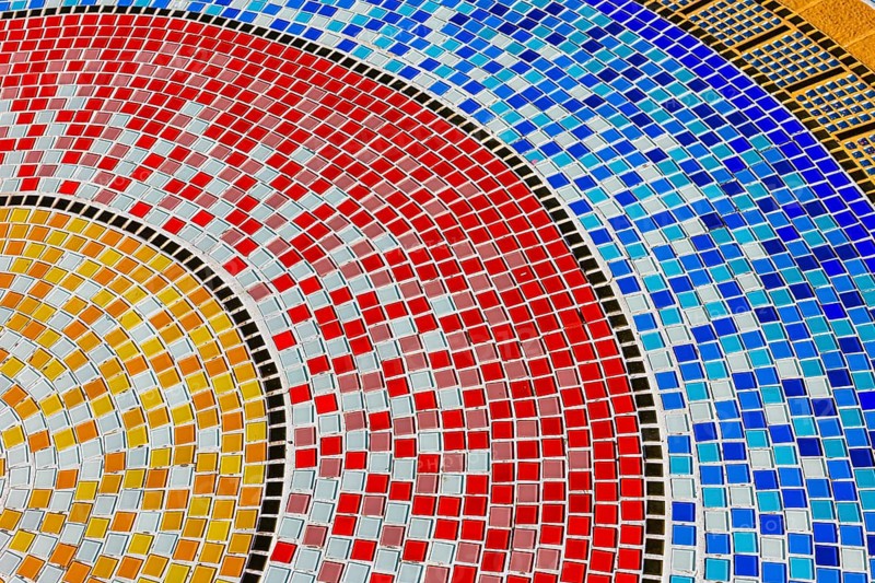 Floor covering decorated with small, colorful stone tiles, Buddhist temple complex Wat Phra That Sorn Kaew, Phetchabun province, Thailand