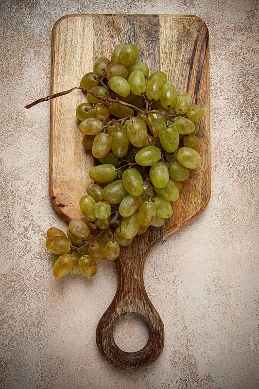 A branch of white grapes, wine grapes, Georgian grape variety Rkatsiteli, top view