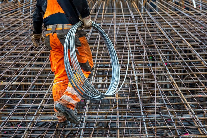 Assembly of reinforcing steel for the reinforced concrete foundation of a wind turbine, a mesh of rebar and rebar mesh, over 100 tons of reinforcing steel were used, the wind turbine will have a hub height of 160 meters, part of a new wind farm in Sauerland, near Balve, North Rhine-Westphalia, Germany