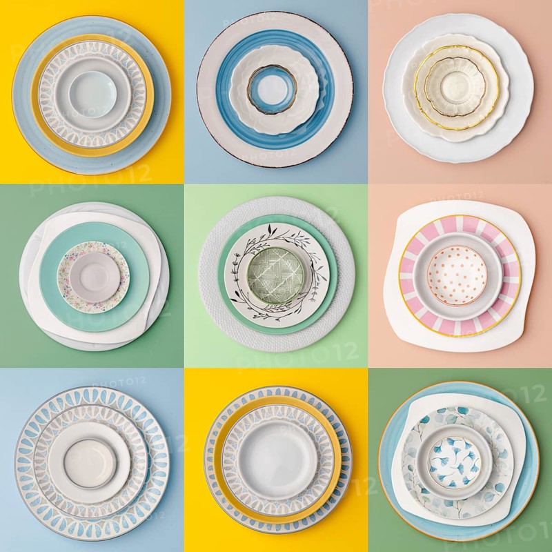 A collection of ceramic plates arranged in a grid, showcasing various designs and colors on vibrant backgrounds. Each plate stack offers a unique style and pattern combination