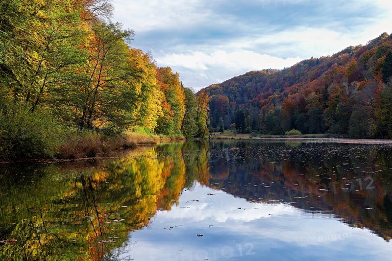 Egelsee in autumn-colored surroundings, Bergdietikon, Canton of Aargau, Switzerland