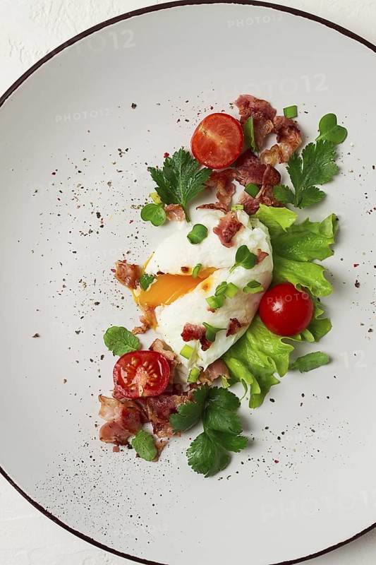 Poached egg, with bacon and vegetables, breakfast, homemade