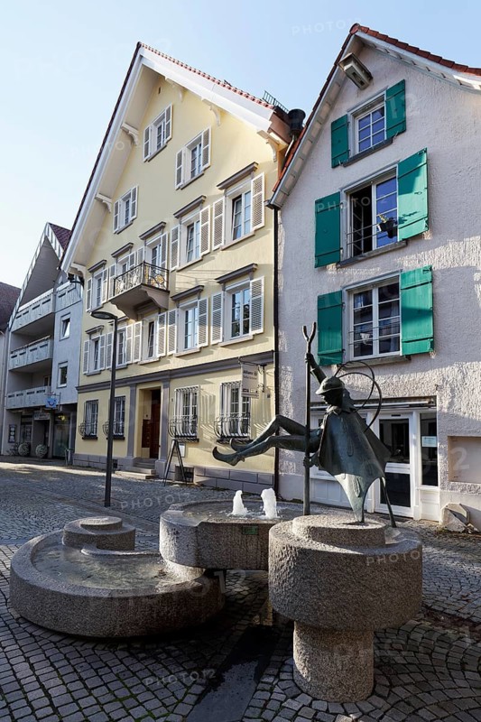 Federle fountain, carnival figure at the Narrensprung, Bad forest lake, Upper Swabia, Baden-Württemberg, Germany