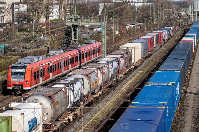 Local trains on the line, container trains in the freight yard, so-called installation tracks in Duisburg-Rheinhausen, freight trains are parked here at short notice in front of continuing their journey, either to the trimodal terminal in Logport Duisburg or from there to distant destinations, such as China, as part of the new Silk Road, North Rhine-Westphalia, Germany