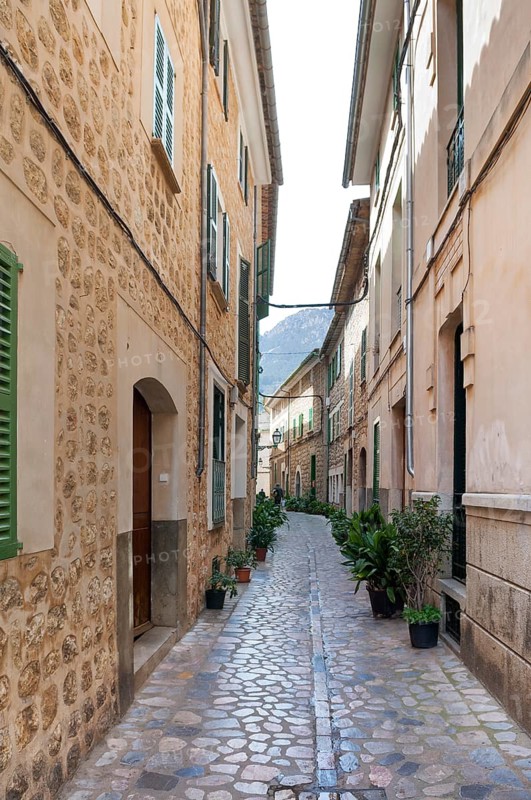Narrow alley in Sòller, Majorca, Spain