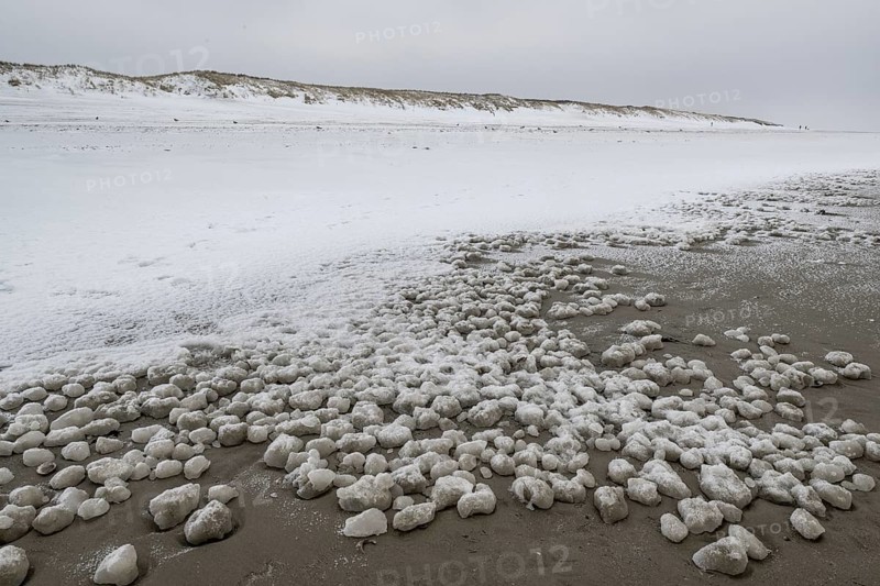 Snow-covered dunes on the North Sea beach, Langeoog, Lower Saxony, Germany