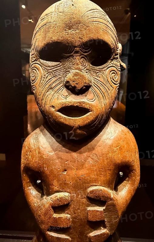 Head, carved wooden figure with artistic pattern, Maori art, Museum Five Continents, Bavaria, Germany