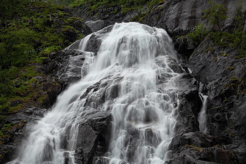 Summer day visiting Espelandsfossen falls near Bergen, scenic nature and flowing water, Vestland, Norway