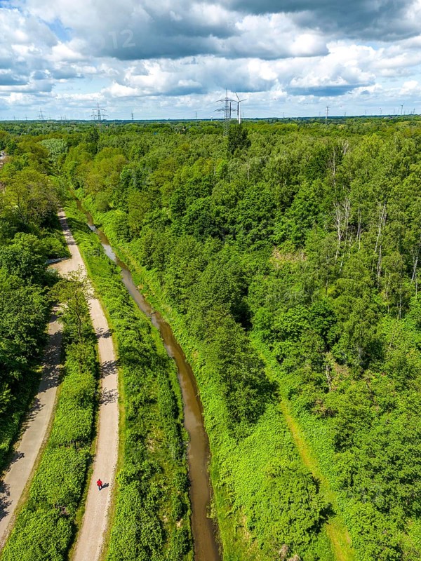 The Boye, stream, runs for 13.8 km through the towns of Gladbeck, Bottrop (photo) and Essen, a former cesspit, sewage river, since 2017 the sewage has been canalised, the Boye is sewage-free and in large parts, as here in Bottrop, renaturalised, along the Rheinbaben slag heap, part of the Emscher conversion project, North Rhine-Westphalia, Germany