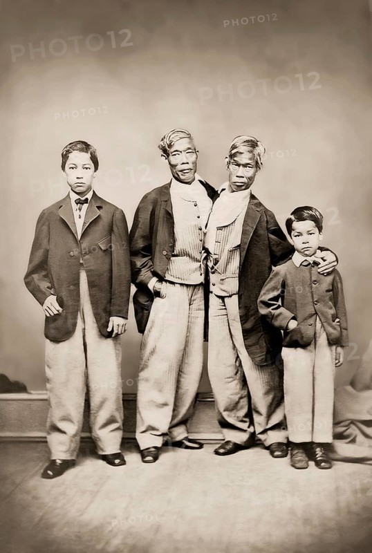 Chang and Eng Bunker, 1811–1874, known as the Siamese Twins, with two children, digitally edited according to a photograph by Germon, 1869