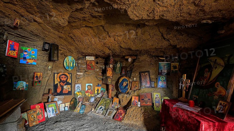 Religious icons and altar table in a cave, spiritual atmosphere, chapel, Agios Nikolaos, rock chapel, Oasis Beach, east coast Rhodes, Rhodes, Dodecanese, Greek Islands, Greece
