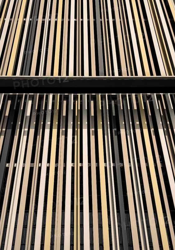 Top view of contemporary geometric building with geometric lines and stripes