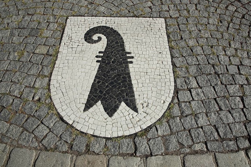 Black and white floor mosaic and coat of arms of Basel bishops, Basel staff, Basel Swiss, episcopal staff, crook, shepherd's staff, handicrafts, paving stones, Neutorplatz, Breisach, Breisgau, Baden-Württemberg, Germany