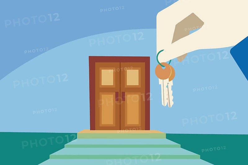 A hand holds a set of keys, poised to open a charming door, symbolizing new opportunities and the excitement of homeownership in real estate
