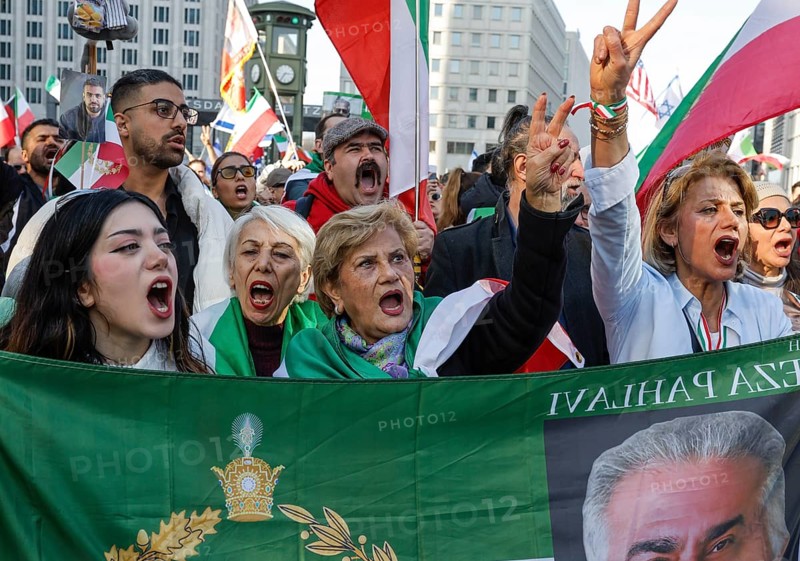 Iranians demonstrate on the day of the US and Israeli attack on Iran in Berlin, 28.02.2026. People cheer the rumor that Obermullah Khamenei died in the attack, Berlin, Berlin, Germany